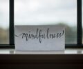 mindfulness printed paper near window